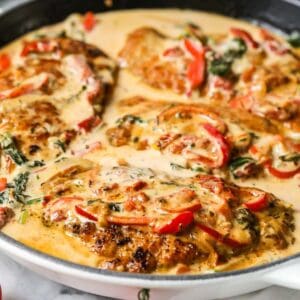 A pan of food with some meat and vegetables.