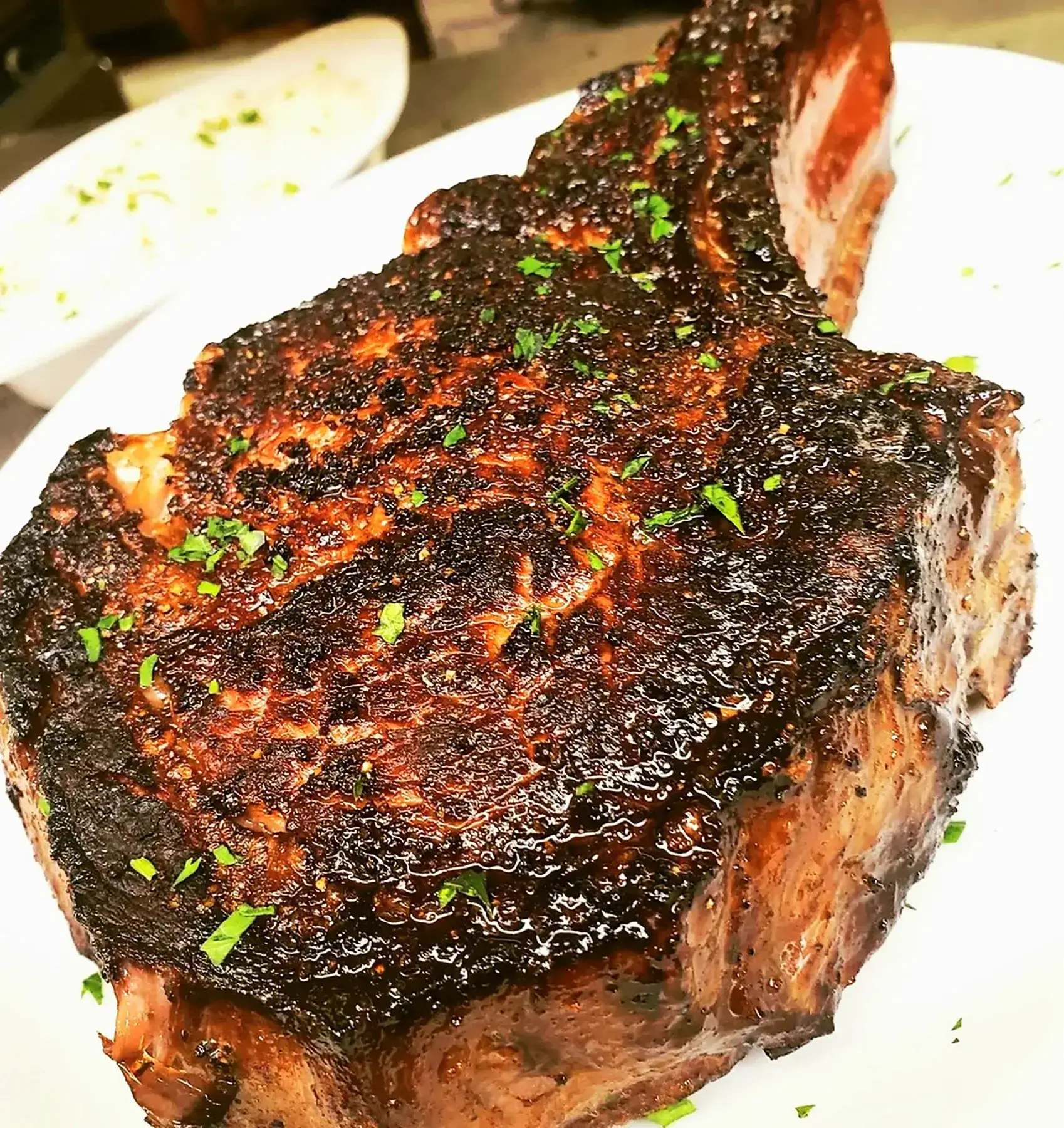 A piece of meat is on the plate.
