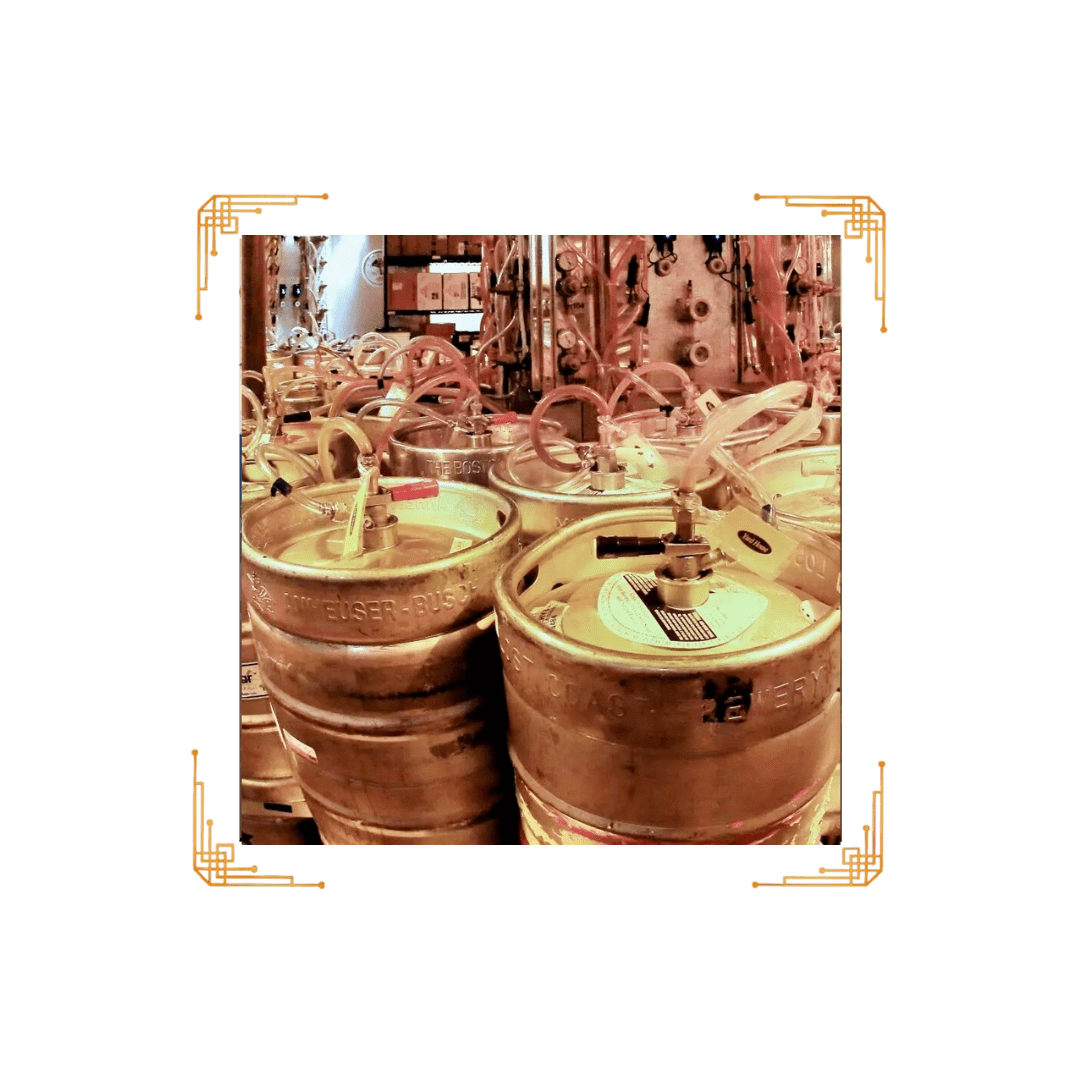 A group of wooden barrels sitting in front of a wall.